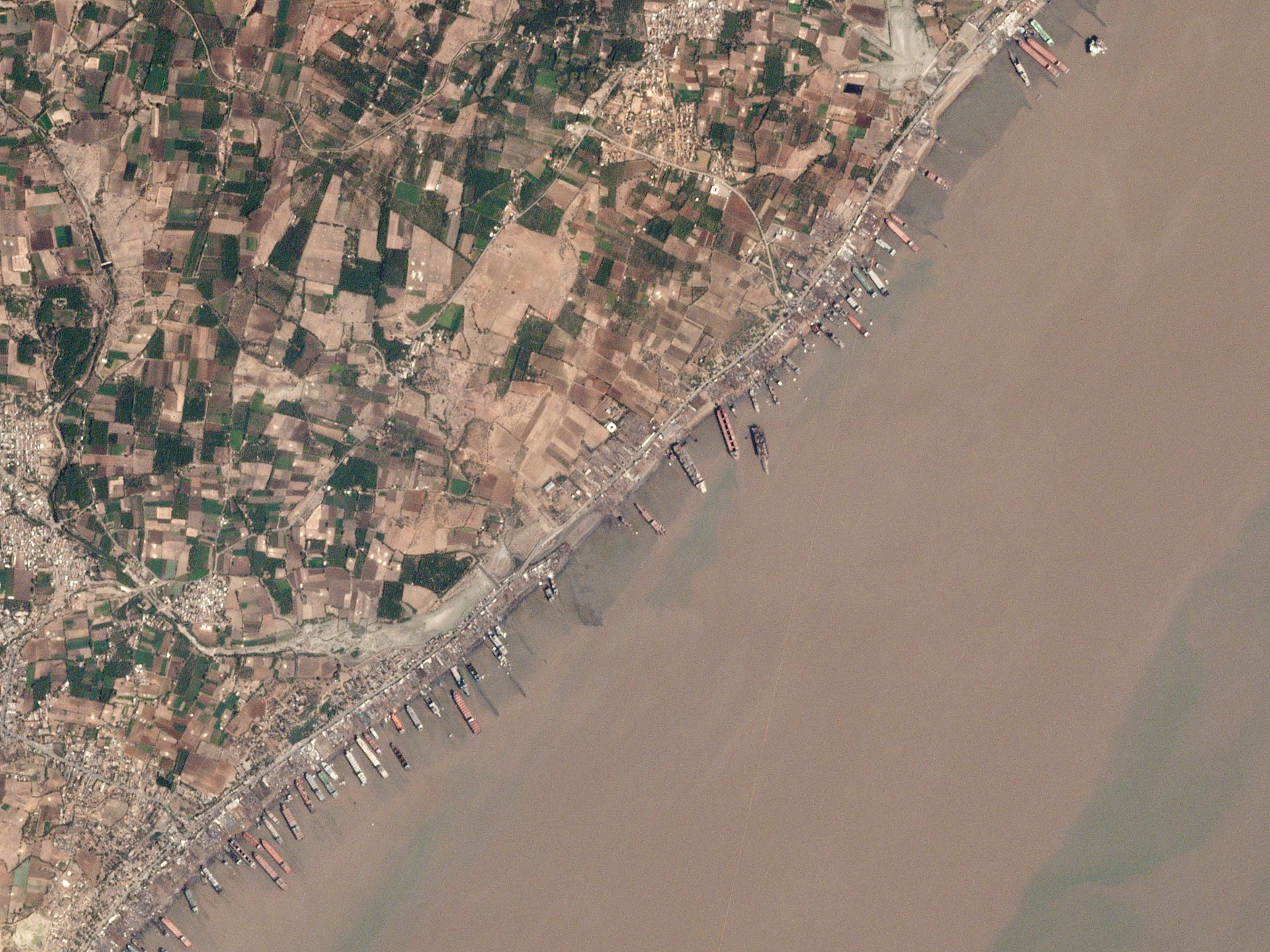 "File:Shipwrecking in Alang, India, 2017-03-17 by Planet Labs.jpg" by Planet Labs, Inc. is licensed under CC BY-SA 4.0